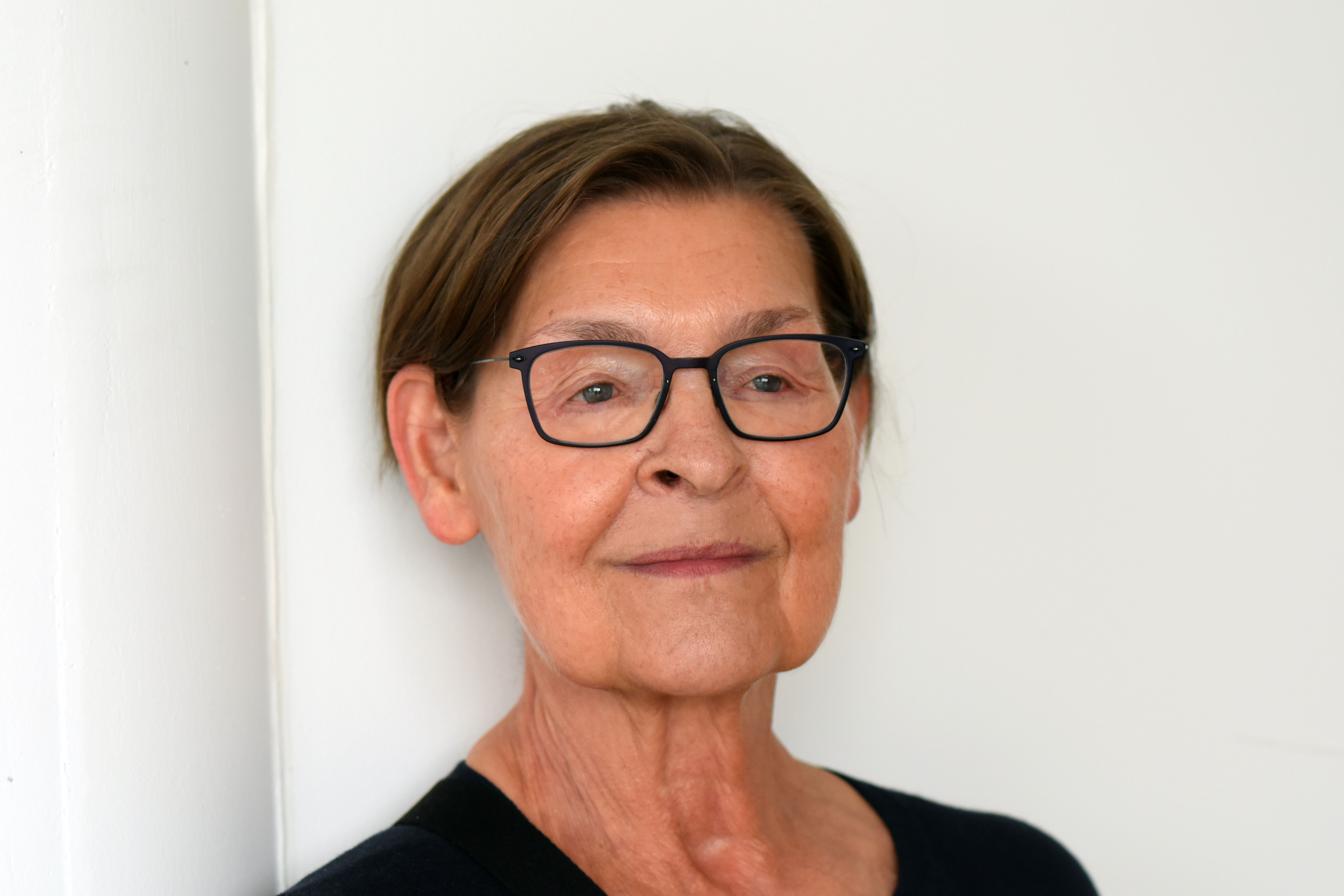 En person med briller