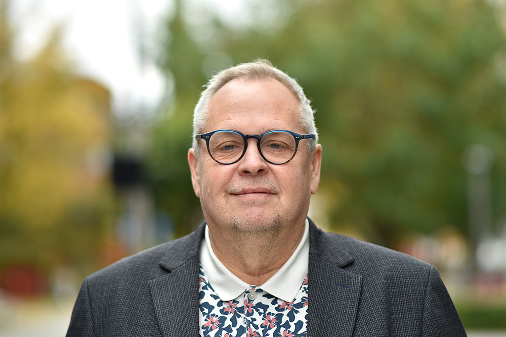 A man wearing glasses